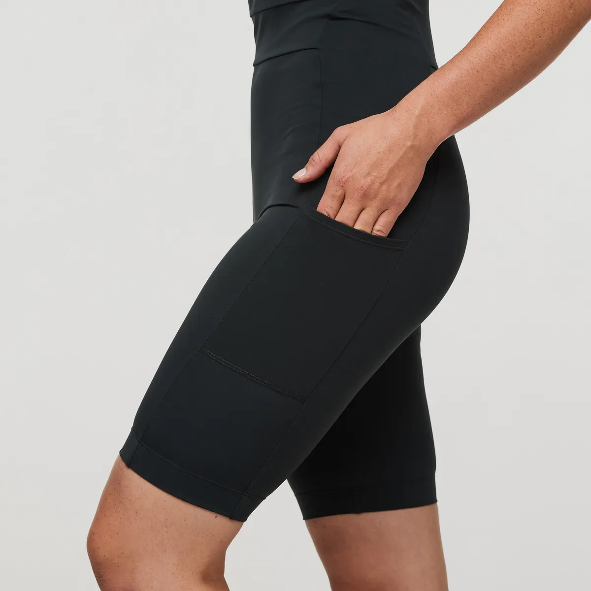 Cotopaxi Muevo bodysuit femme noir recyclé sport