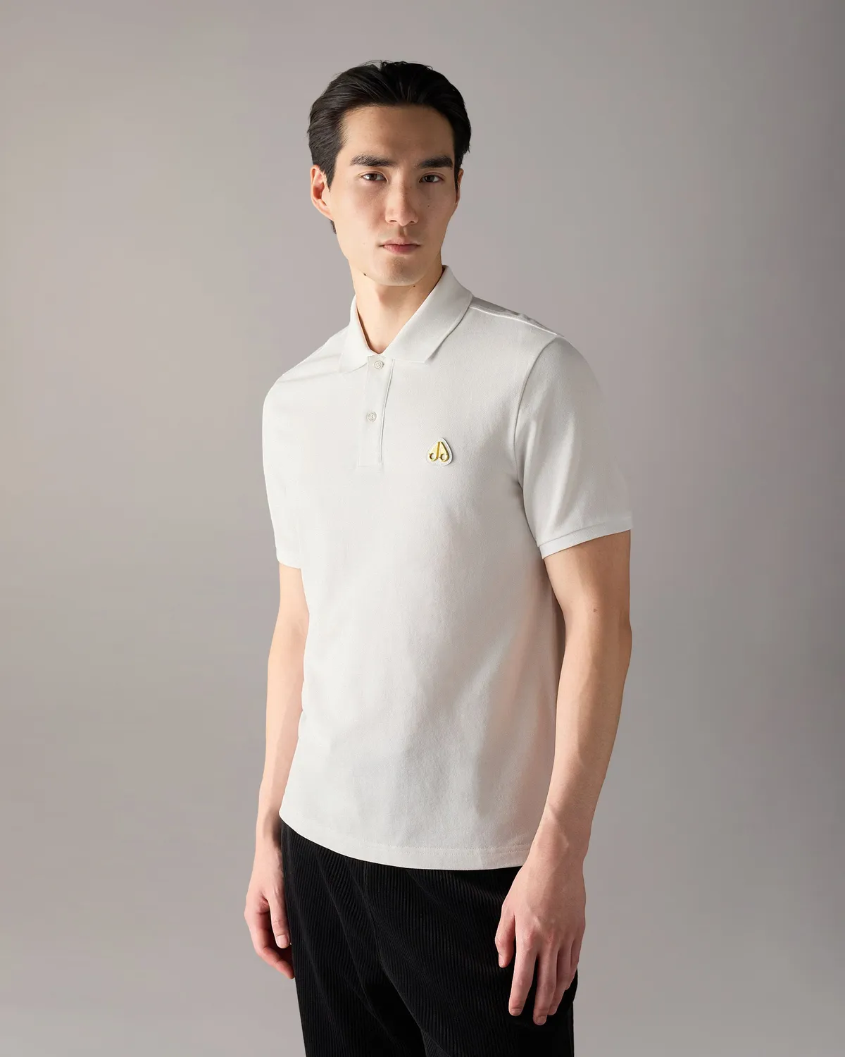 Moose Knuckles Gold Everett polo marine coton raffiné
