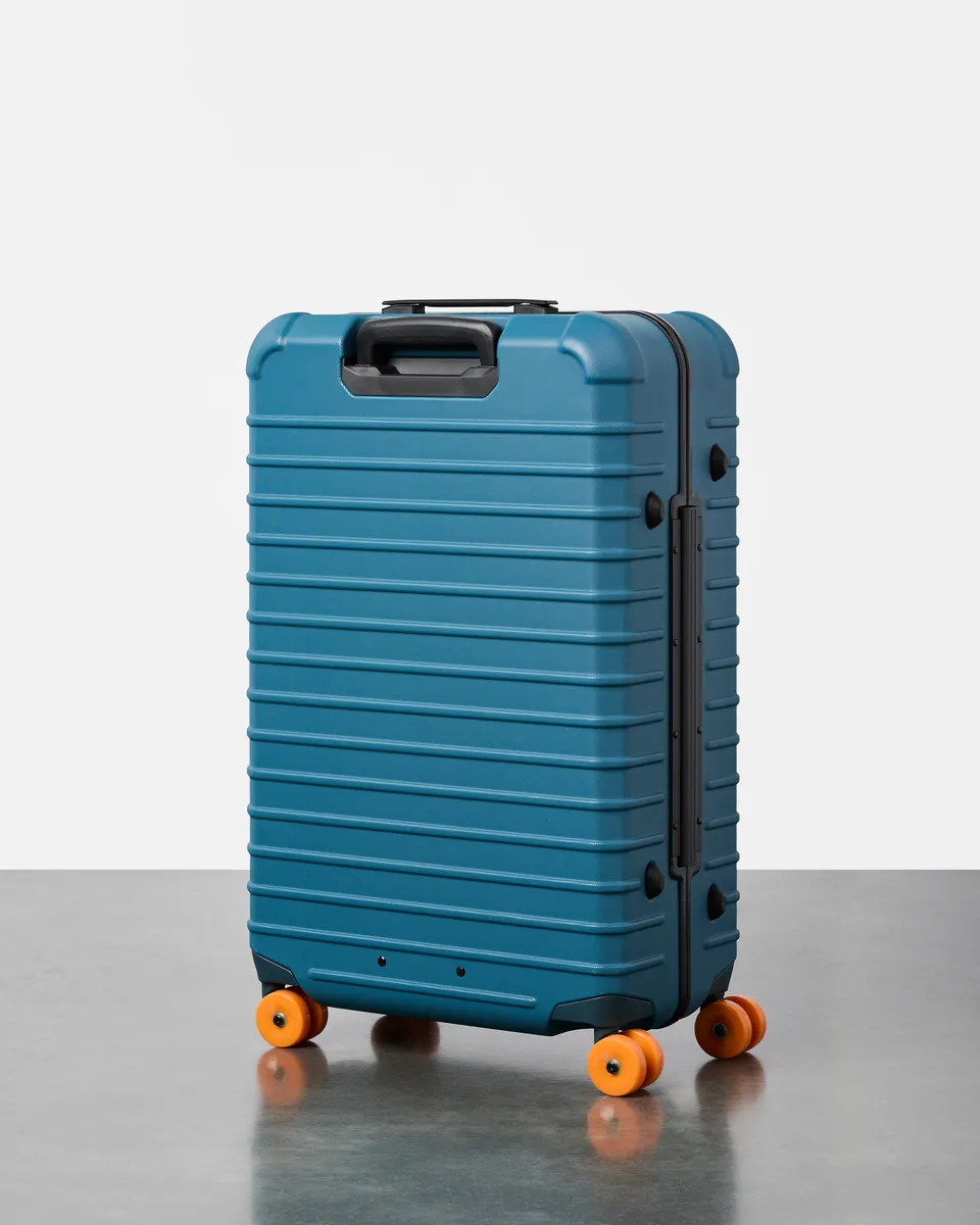Cotopaxi Coraza valise soute Blue Spruce 4 roues